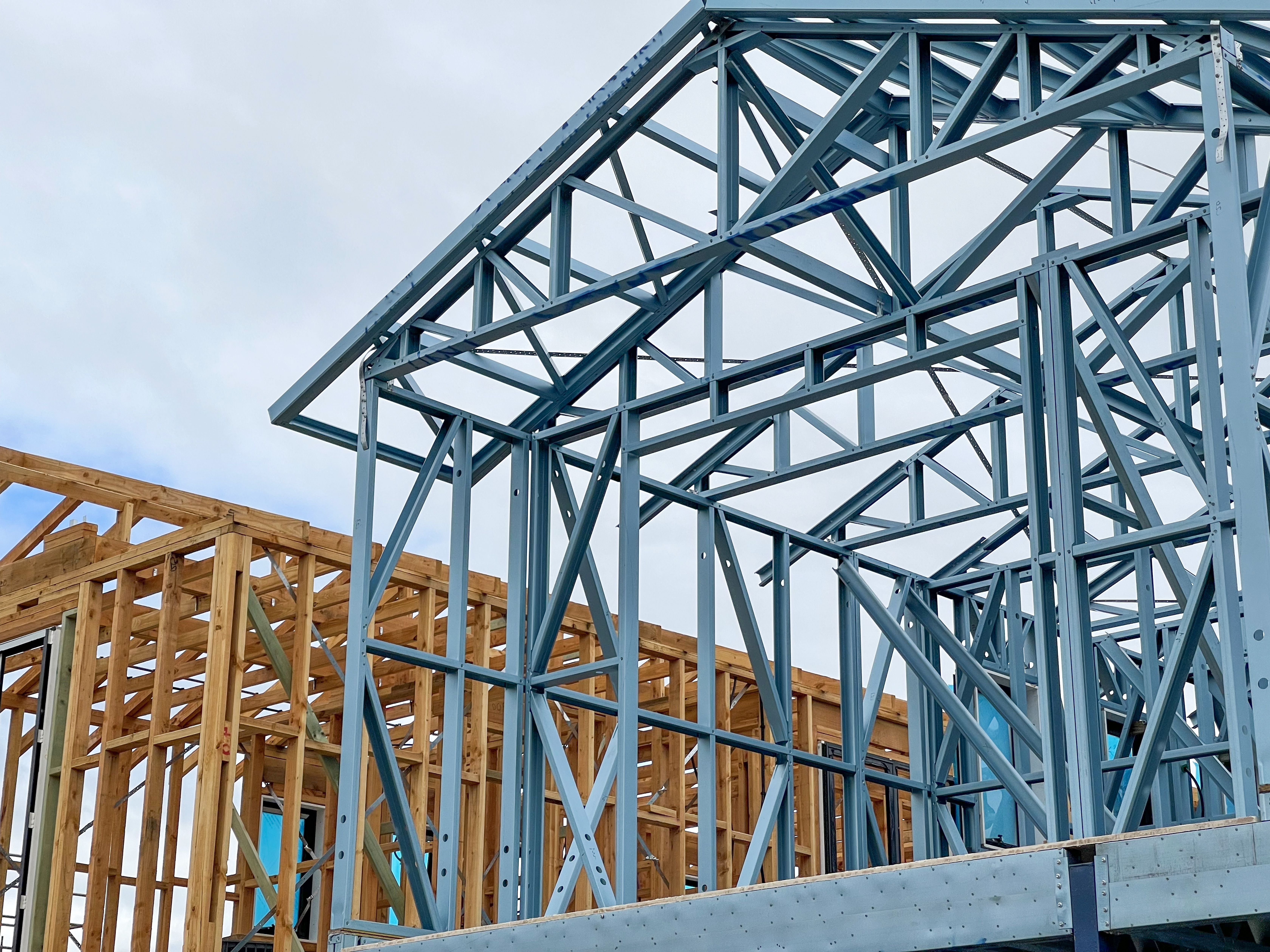 Steel and wood building frame under construction.